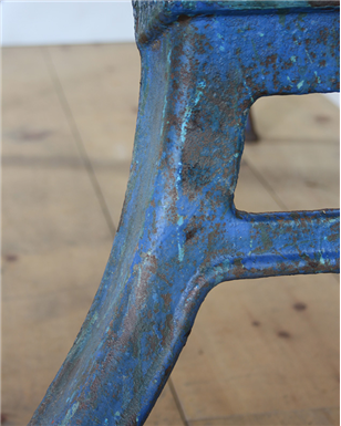 large holed blue legged table