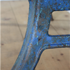 large holed blue legged table